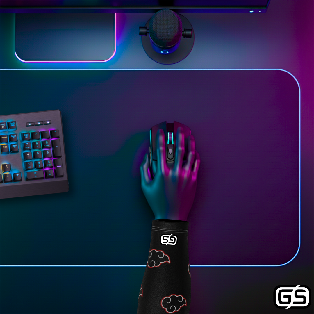 Close-up of a hand using a mouse while wearing a colorful compression gaming sleeve, shown in an RGB-lit gaming and streaming setup.