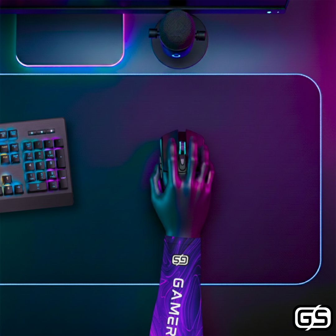 Close-up of a hand using a mouse while wearing a colorful compression gaming sleeve, shown in an RGB-lit gaming and streaming setup.