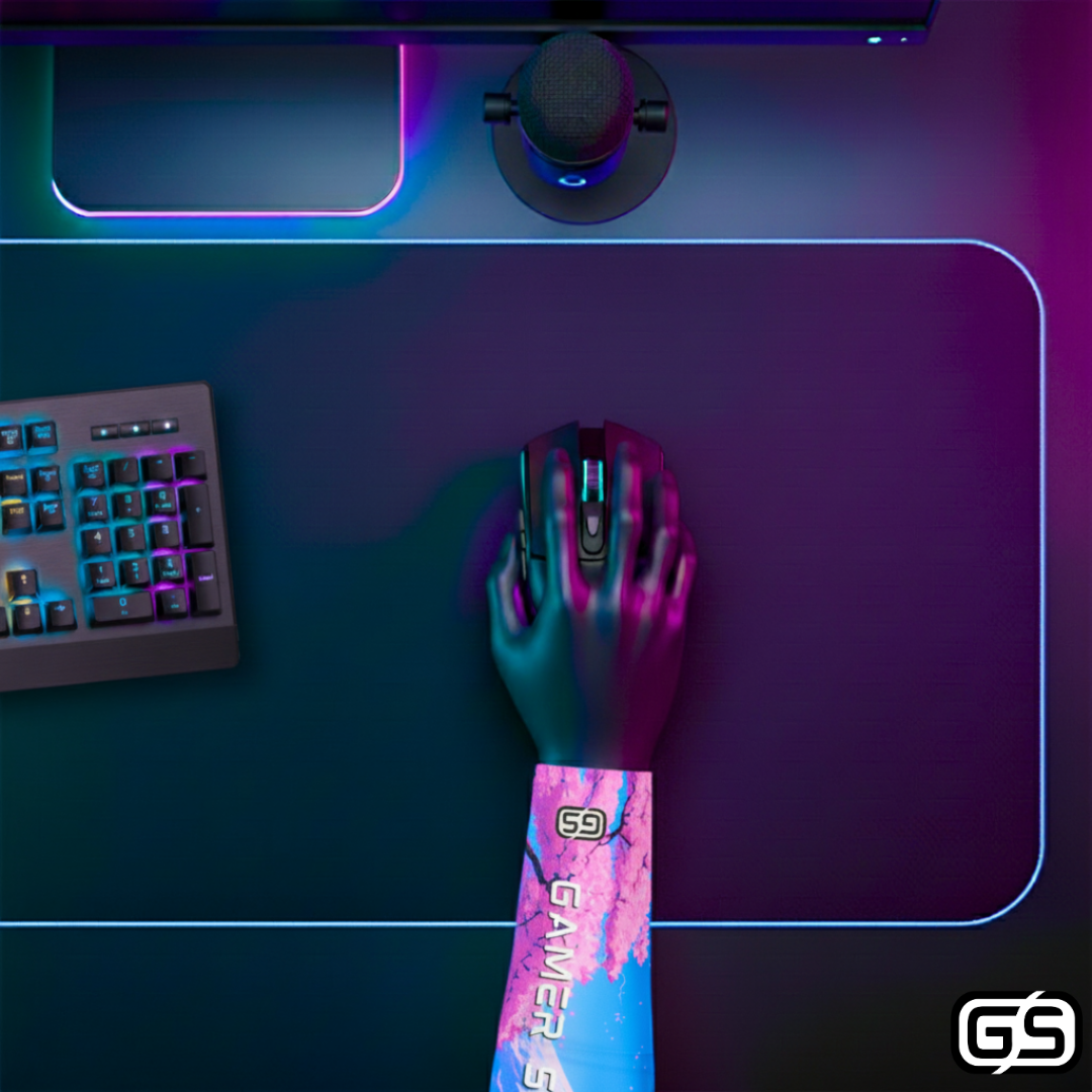 Close-up of a hand using a mouse while wearing a colorful compression gaming sleeve, shown in an RGB-lit gaming and streaming setup.