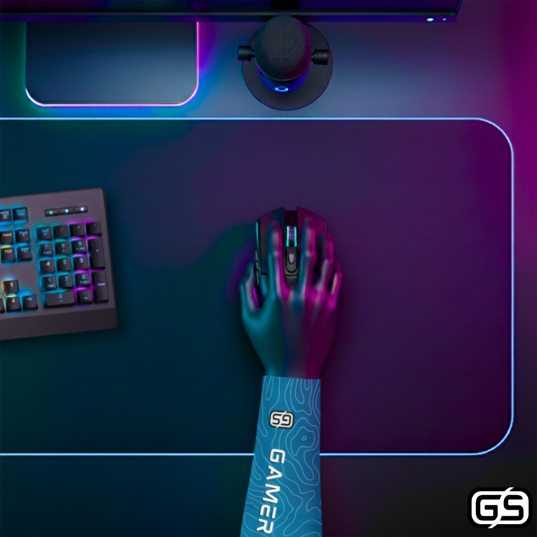 Close-up of a hand using a mouse while wearing a colorful compression gaming sleeve, shown in an RGB-lit gaming and streaming setup.