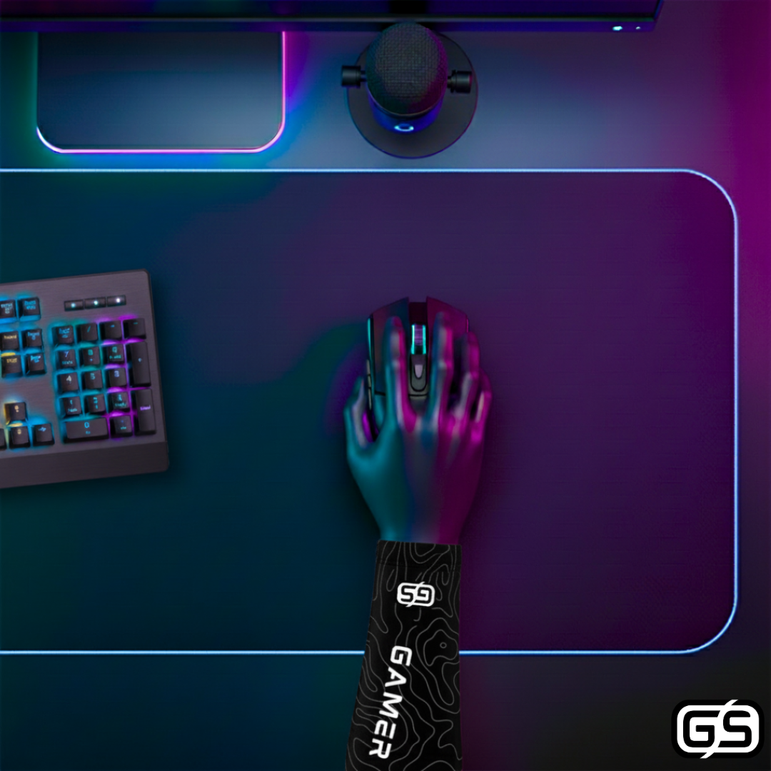 Close-up of a hand using a mouse while wearing a colorful compression gaming sleeve, shown in an RGB-lit gaming and streaming setup.