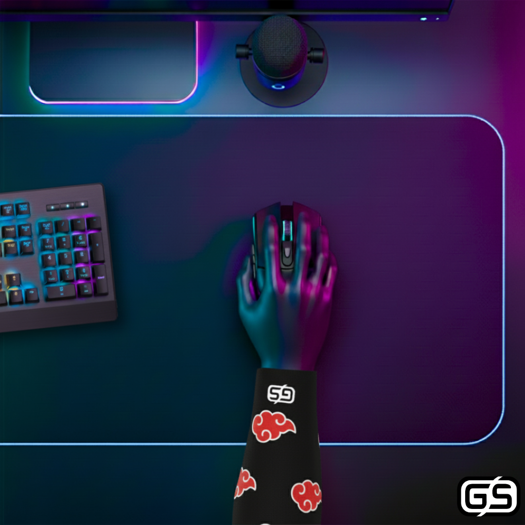 Close-up of a hand using a mouse while wearing a colorful compression gaming sleeve, shown in an RGB-lit gaming and streaming setup.